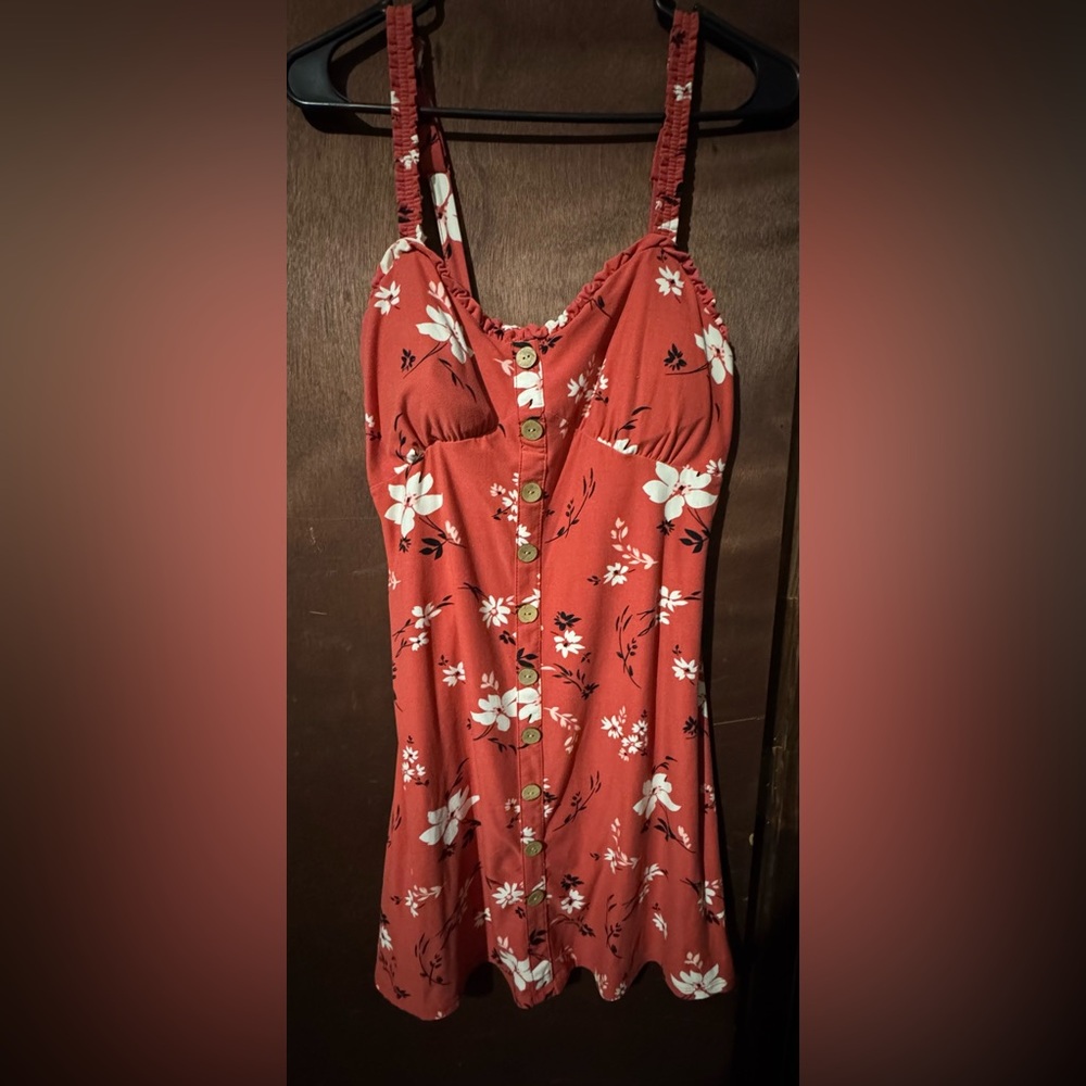 Super cute women’s pinkish /rust colored sun dress with white flowers
